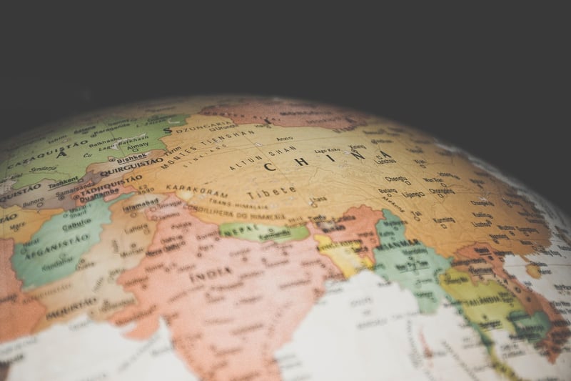 Hands on a world map